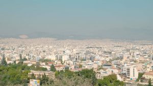 a view of a city from the top of a hill